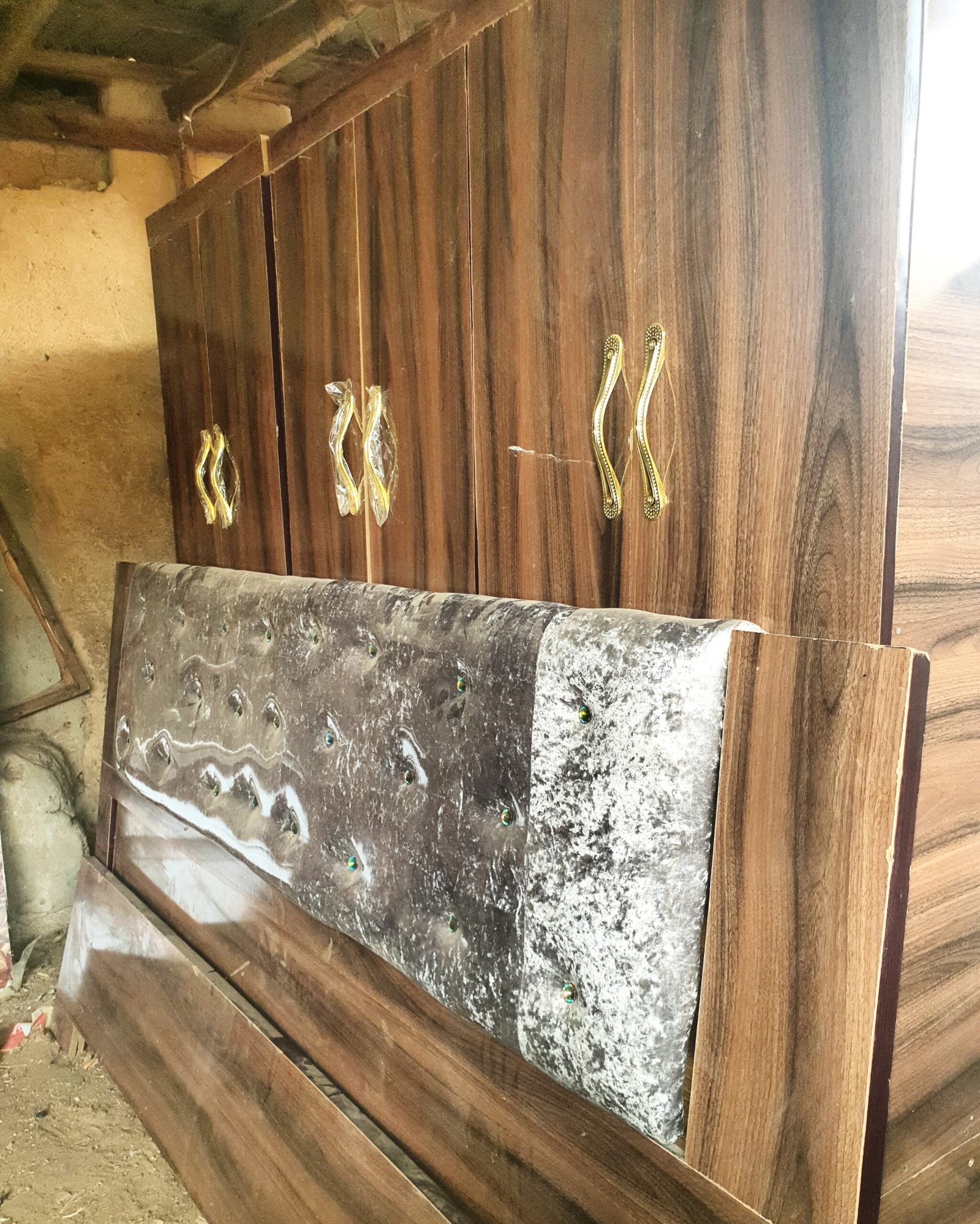 6 by 7 bed frame with a wardrobe and two side drawers.